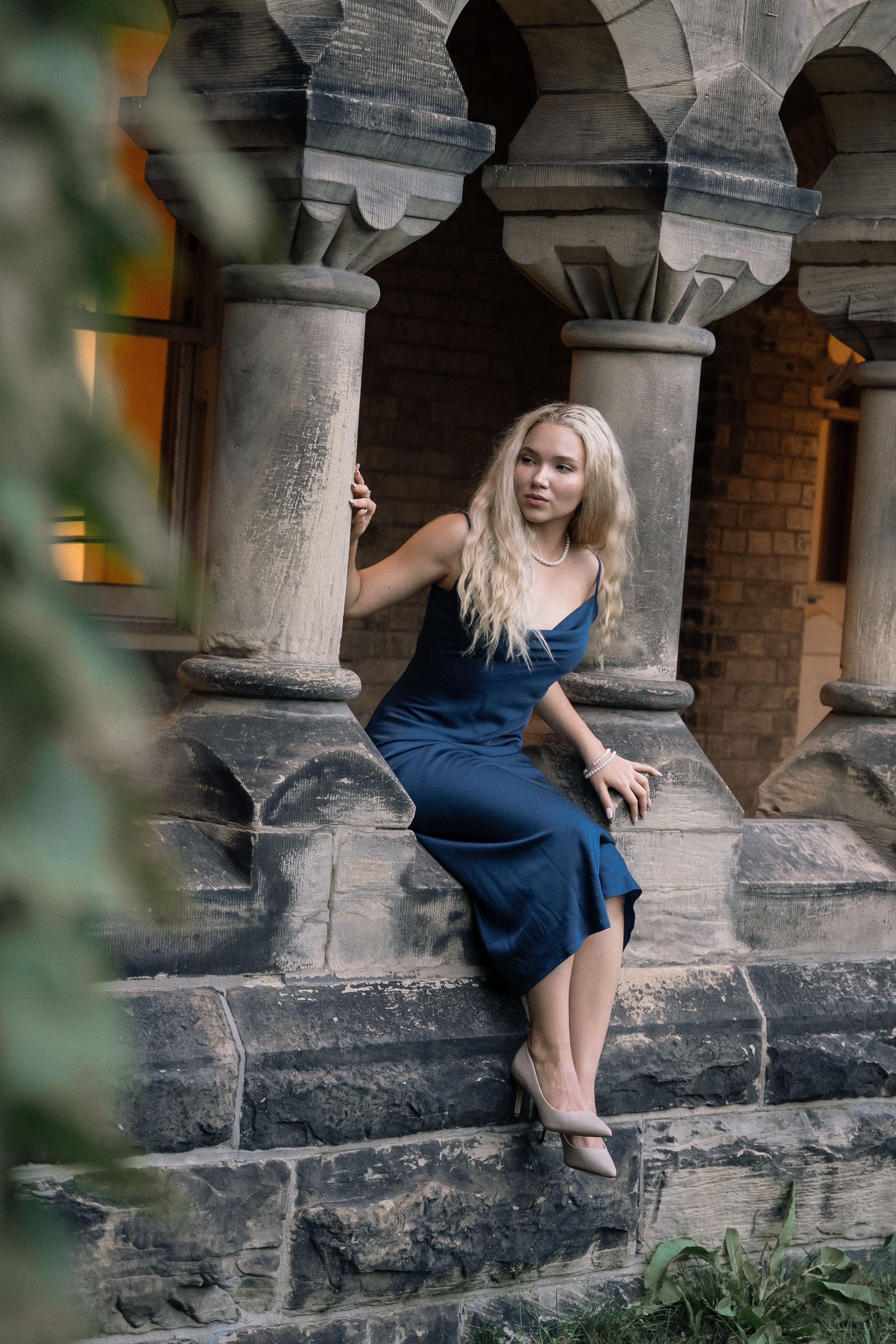 Blonde Model Posing in Dress on Stairs  Free Stock Photo