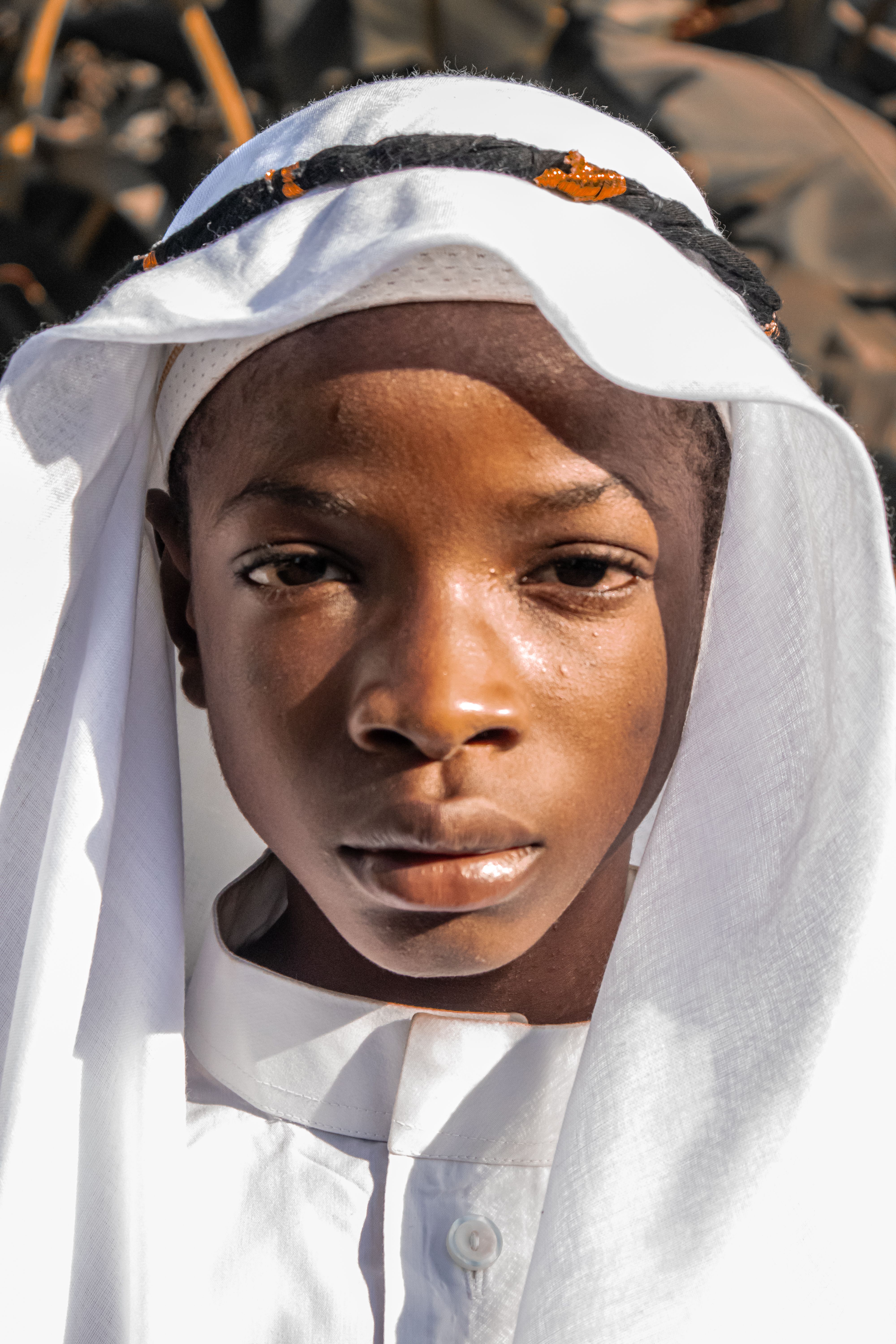 Portrait of a Young Boy in Traditional Attire · Free Stock Photo