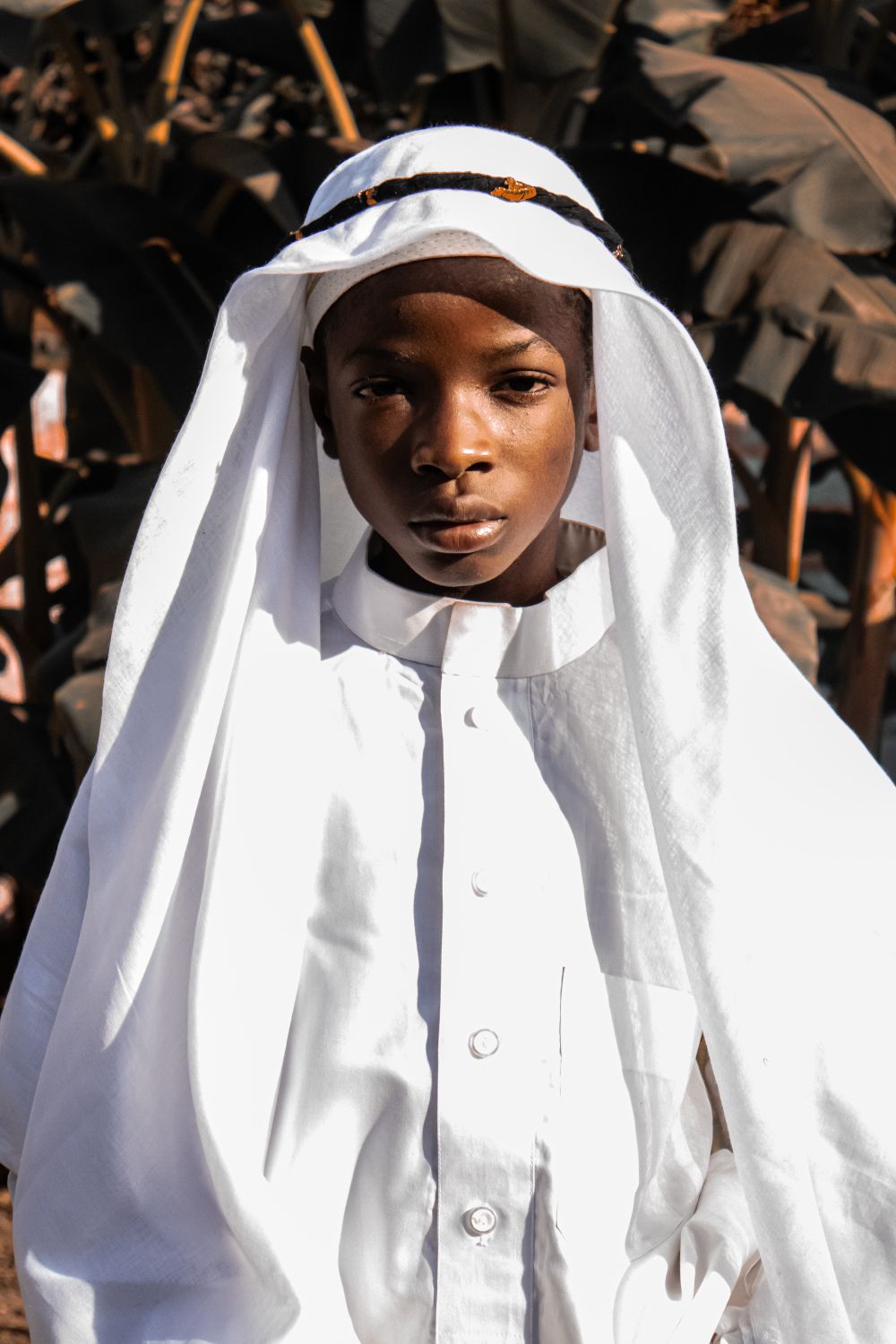 Authentic Boy Portrait of a Young Boy in Traditional Attire · Free Stock Photo