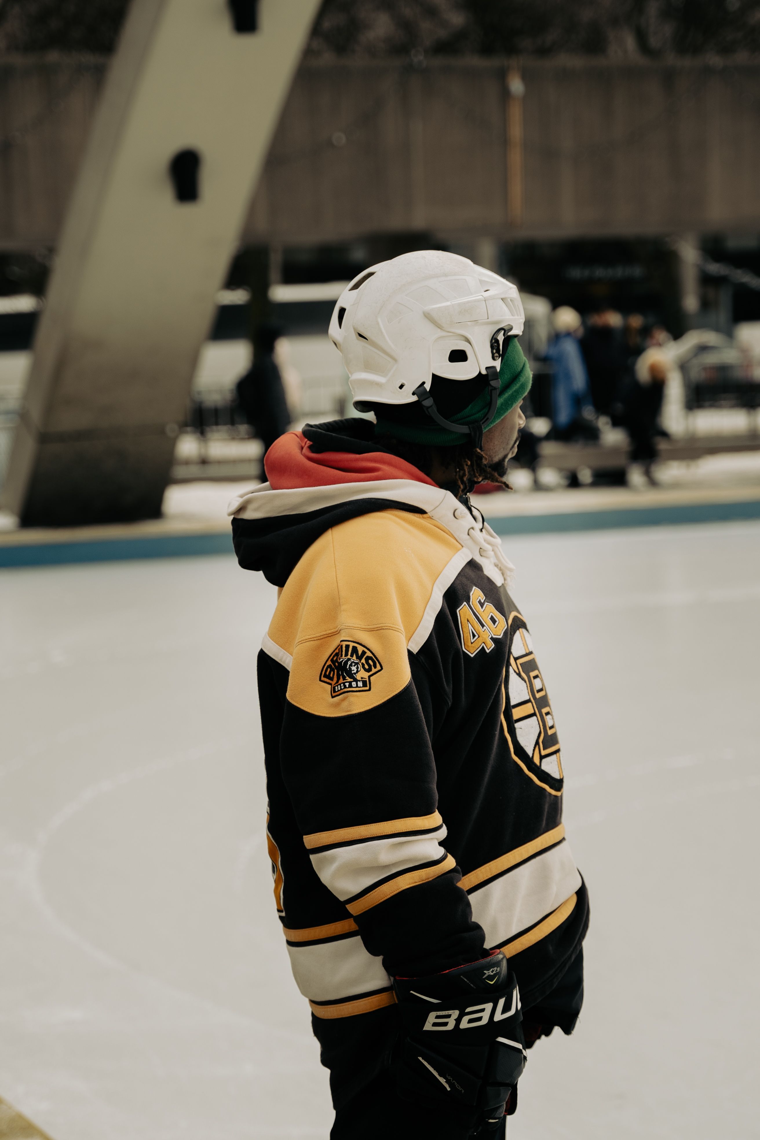 Fan skating in a hockey jersey at dusk