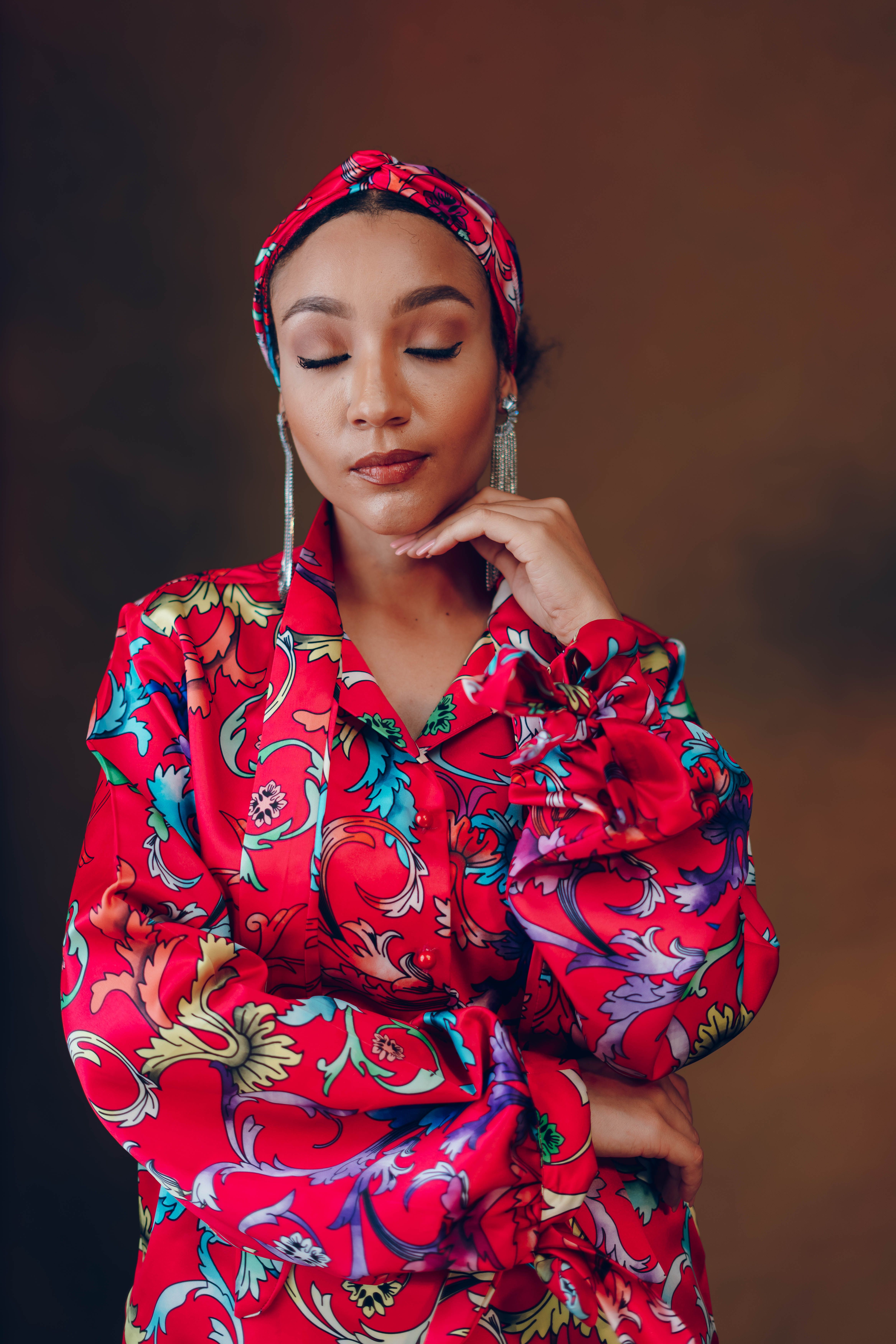 Elegant Portrait of Woman in Colorful Dress · Free Stock Photo