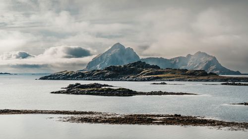 Free Breathtaking landscape of misty mountains and sea in Norway's Lofoten Islands. Stock Photo