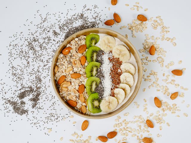Colorful breakfast bowl with fruit and oats