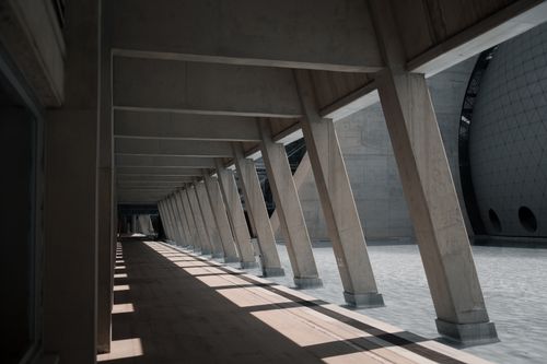 Free Linear perspective of a futuristic concrete corridor with geometric design in Ankara, Turkey. Stock Photo