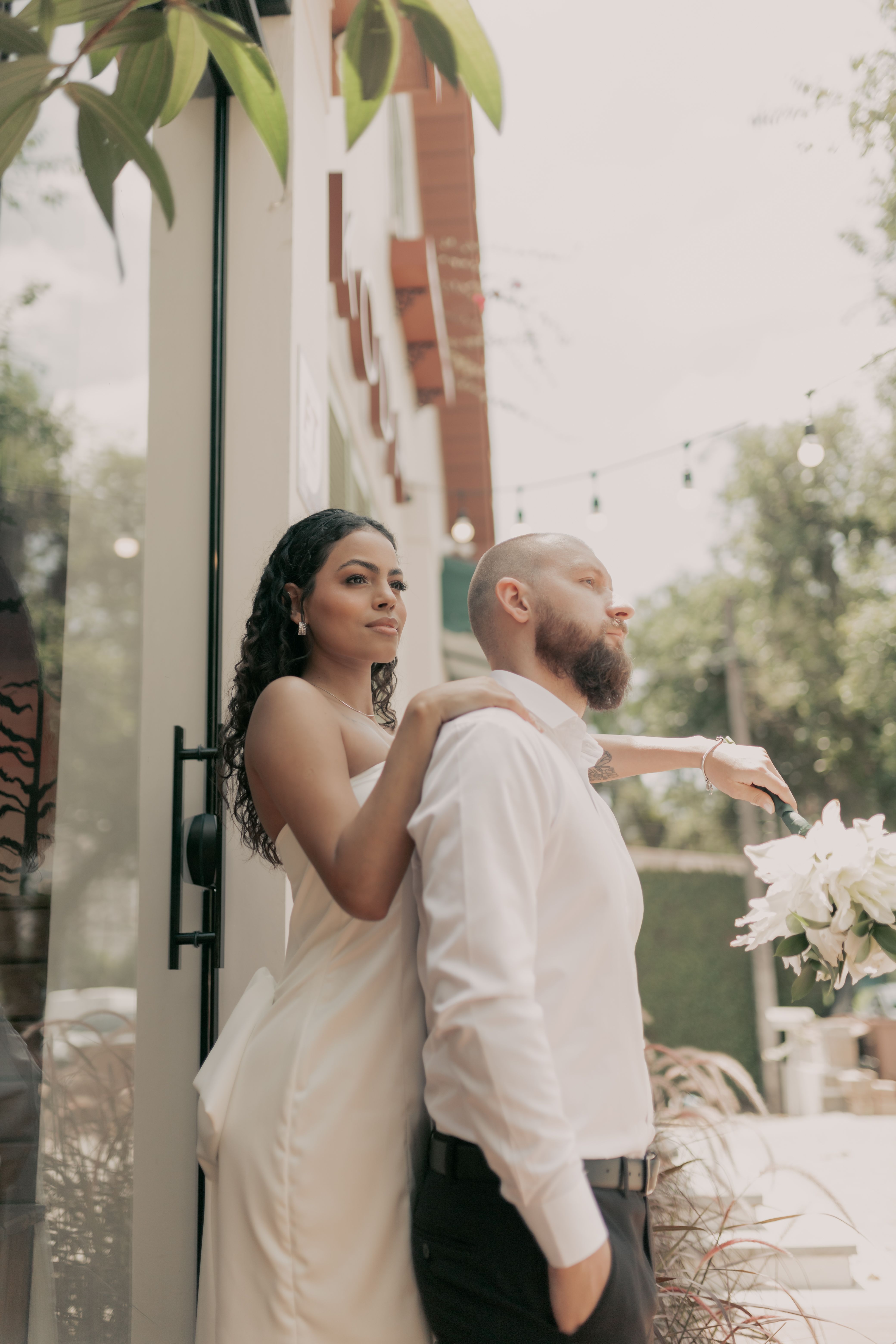Romantic Wedding Couple Embracing Outdoors · Free Stock Photo