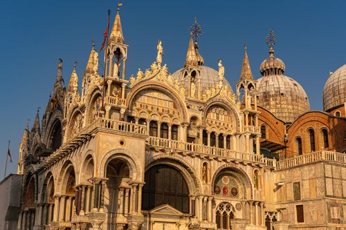 Free Stunning view of St. Mark's Basilica in Venice, Italy, captured at sunset showing intricate architecture. Stock Photo