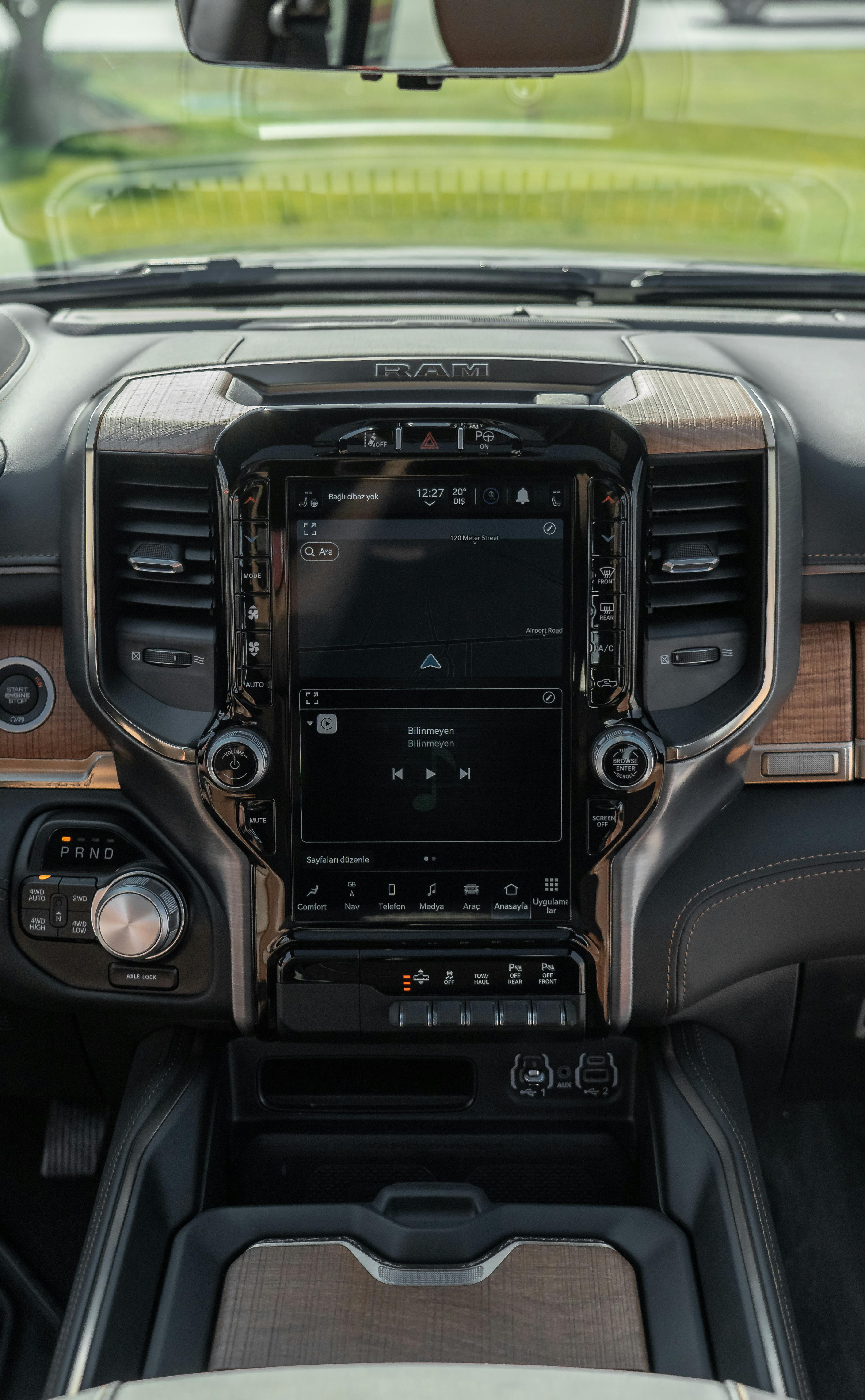 Free Explore the high-tech dashboard of a Dodge RAM featuring sleek design and advanced controls. Stock Photo