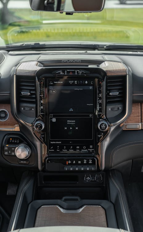 Free Explore the high-tech dashboard of a Dodge RAM featuring sleek design and advanced controls. Stock Photo
