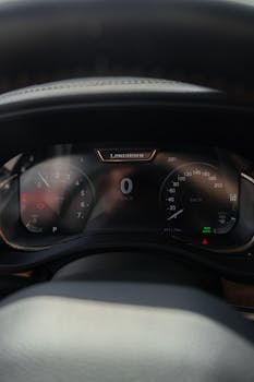 An interior view focusing on the dashboard of a Longhorn vehicle, showcasing the speedometer and odometer.