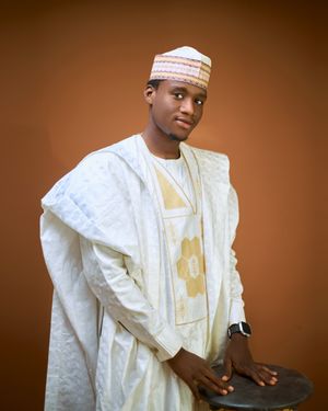 Man in sharply tailored native wear