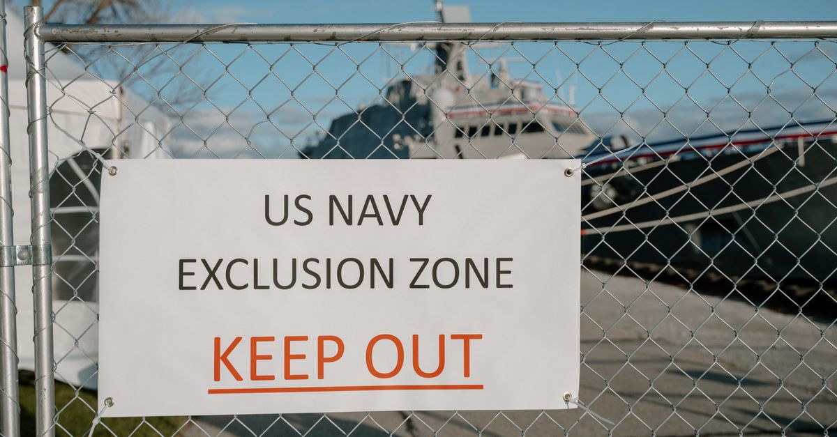 Exclution US Navy Exclusion Zone Sign at Naval Base · Free Stock Photo