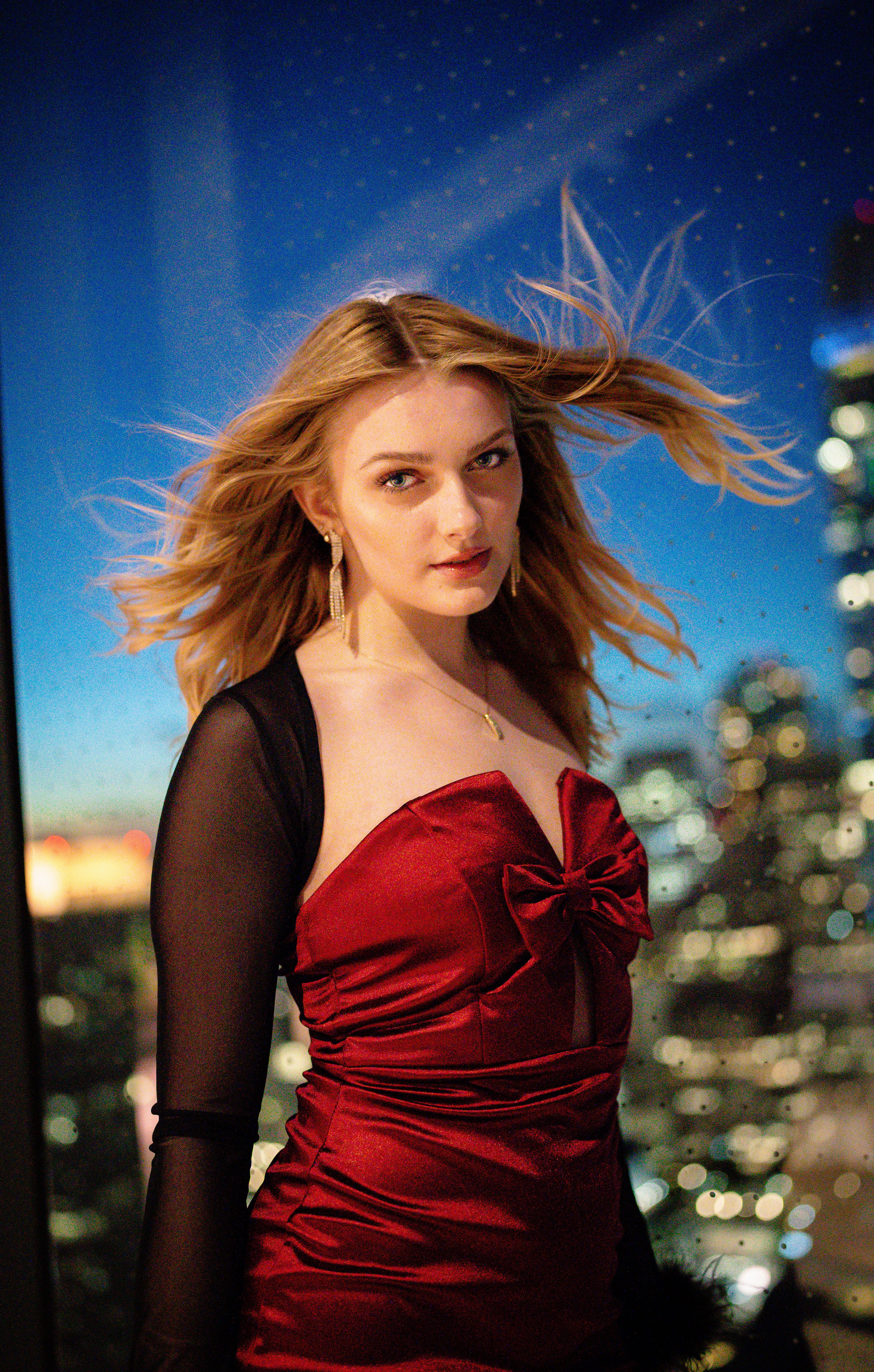 Elegant Portrait of a Woman in Red Dress at Night · Free Stock Photo