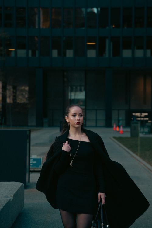 Woman in all black monochrome outfit