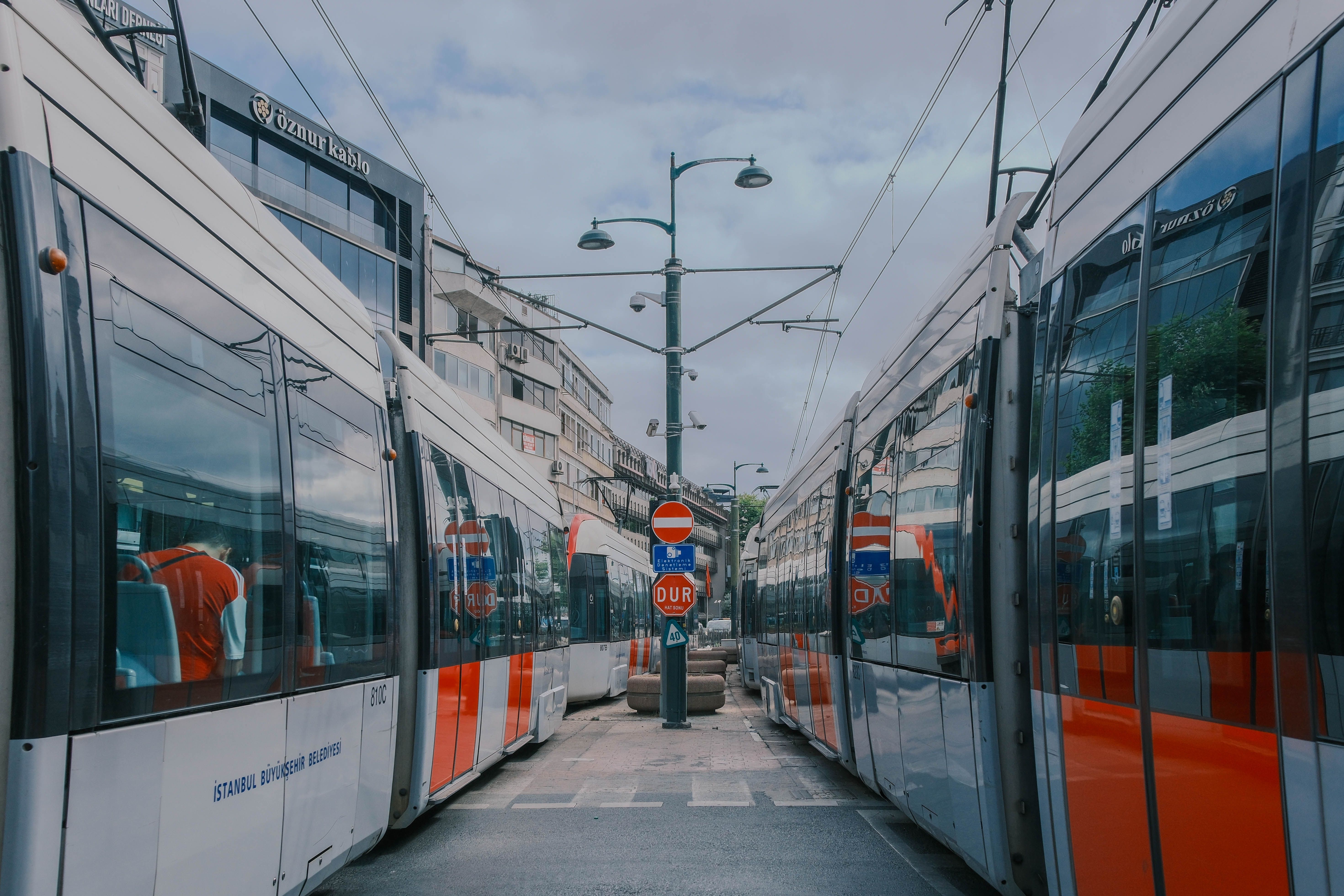 Modern STIB/MIVB tram moving through a street in Brussels, Belgium