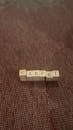 Wooden Blocks Spelling 'Carpet' on Textile