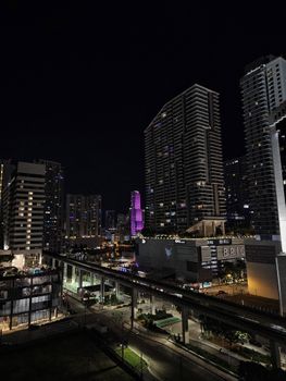 Captivating Miami skyline at night featuring illuminated skyscrapers and urban landscape.