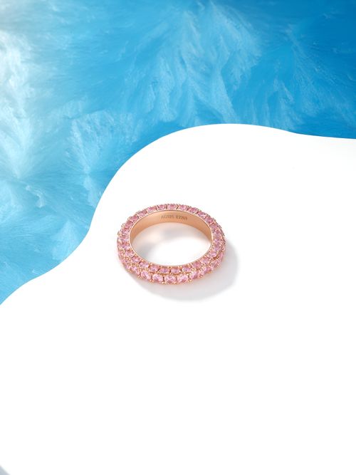 Free A luxurious pink diamond ring displayed on a modern abstract background, showcasing elegance. Stock Photo