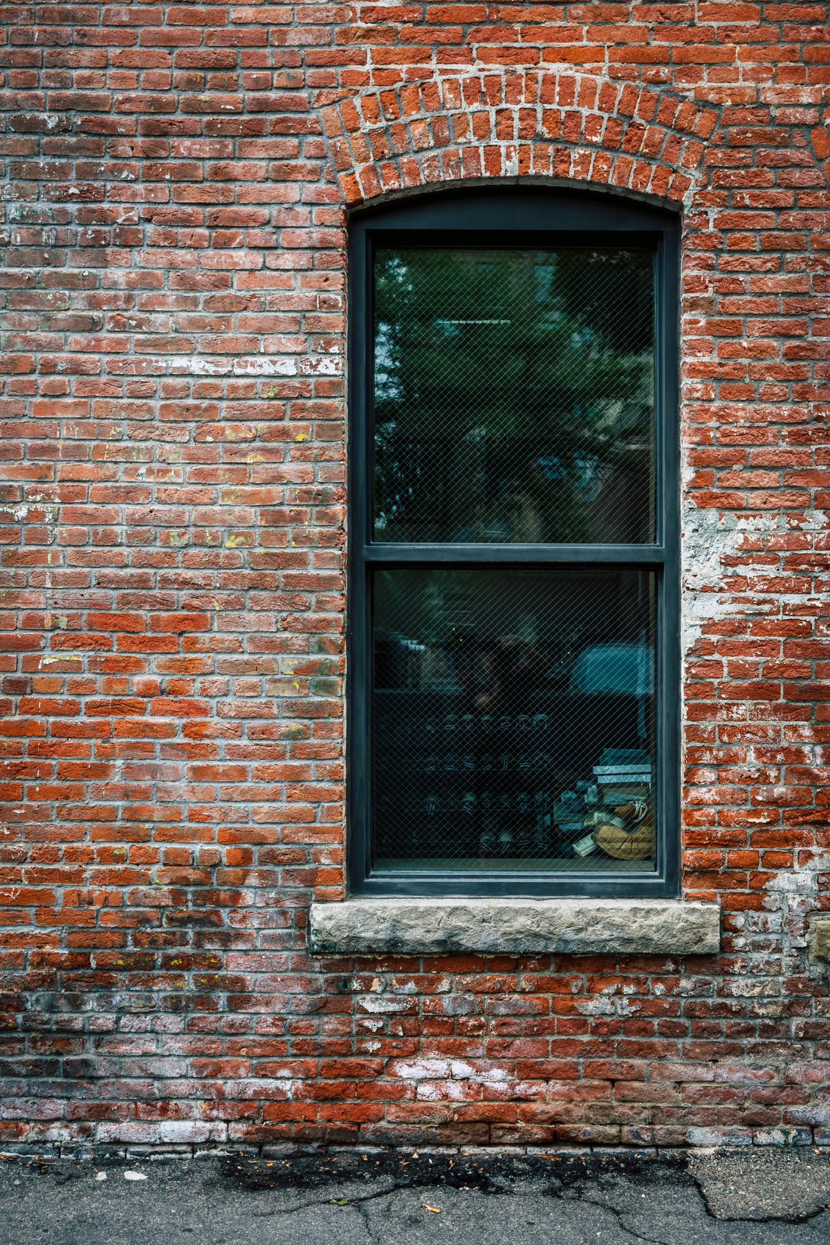Wooden window in brick wall of building · Free Stock Photo