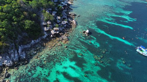 Free Discover the breathtaking beauty of Shark Bay's turquoise waters and rocky coastline in Ko Tao, Thailand. Stock Photo
