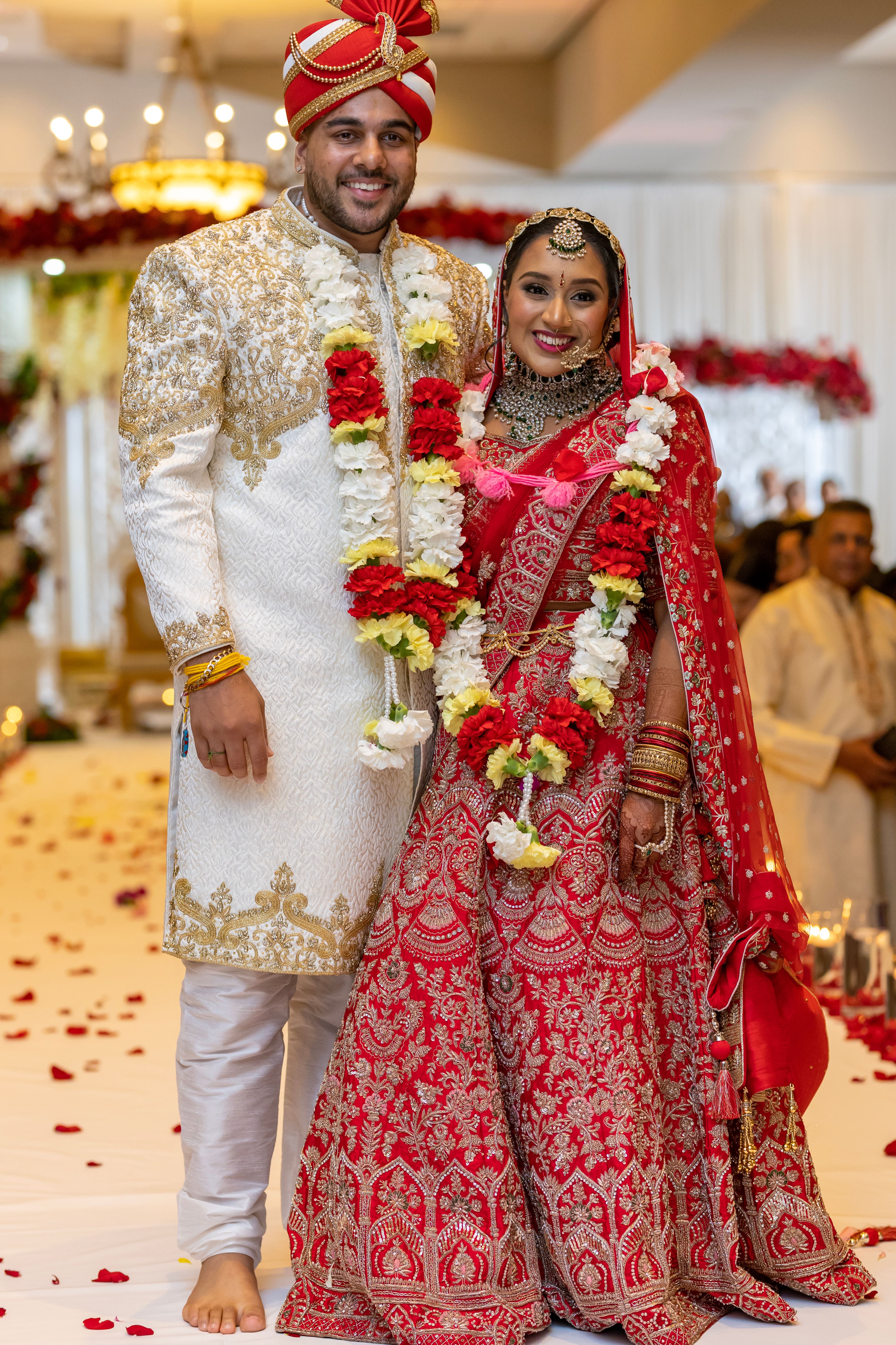 Elegant Indian Wedding Couple in Traditional Attire · Free Stock Photo
