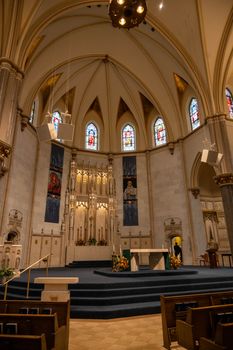 Majestic church interior with stained glass and altar in Milwaukee.