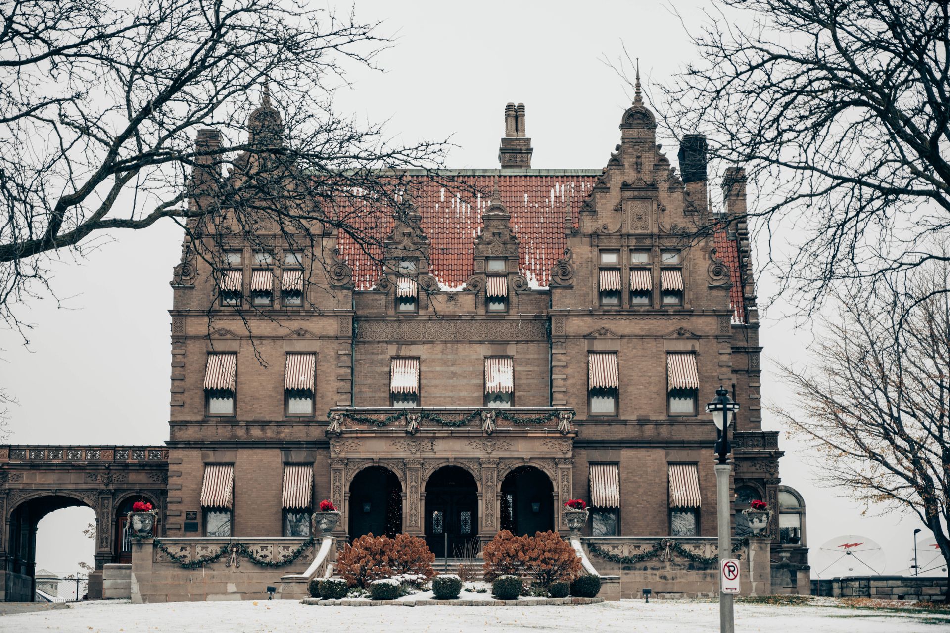 Historic Pabst Mansion in Milwaukee, Wisconsin, captured during a snowy winter day.