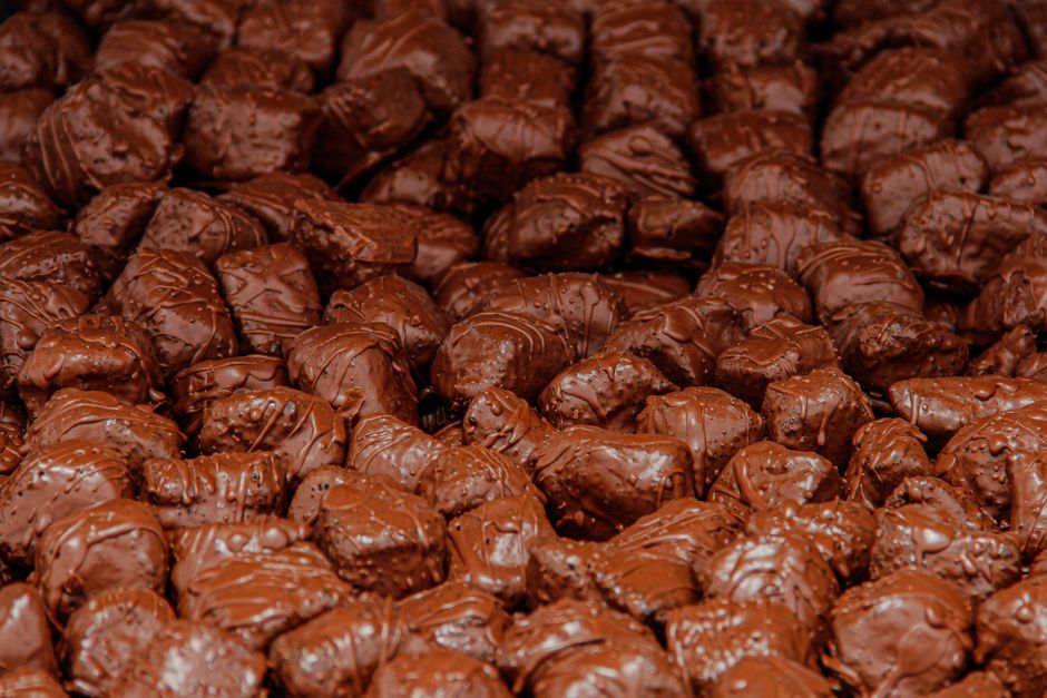 Delicious assortment of chocolate covered treats creating a sweet temptation.