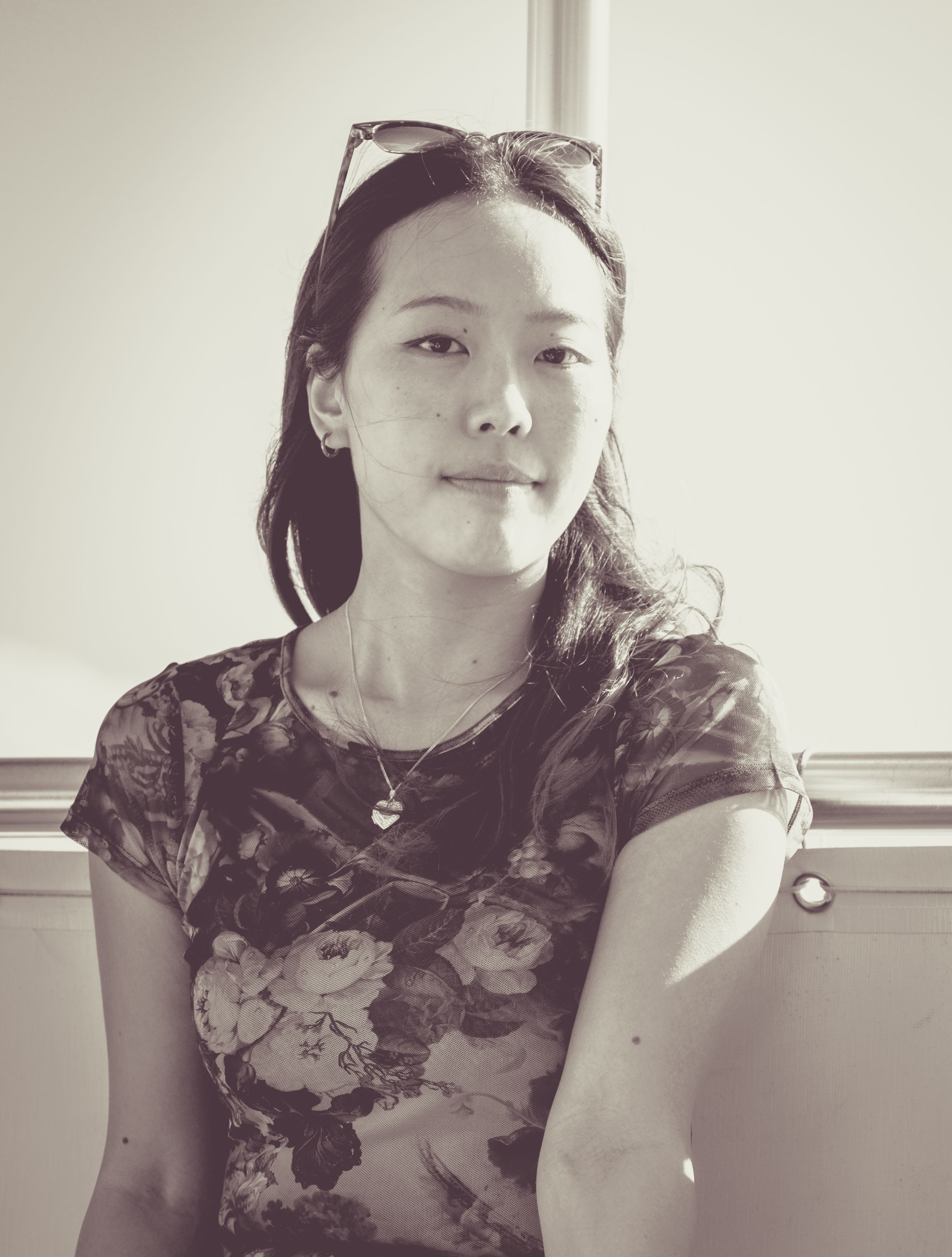 Vintage Portrait of a Woman in Floral Top · Free Stock Photo