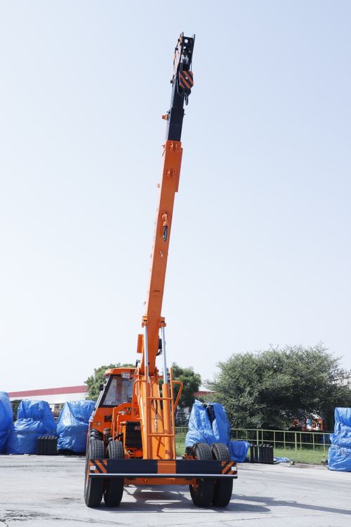 Free Orange mobile crane with extended arm in Faridabad, India. Stock Photo