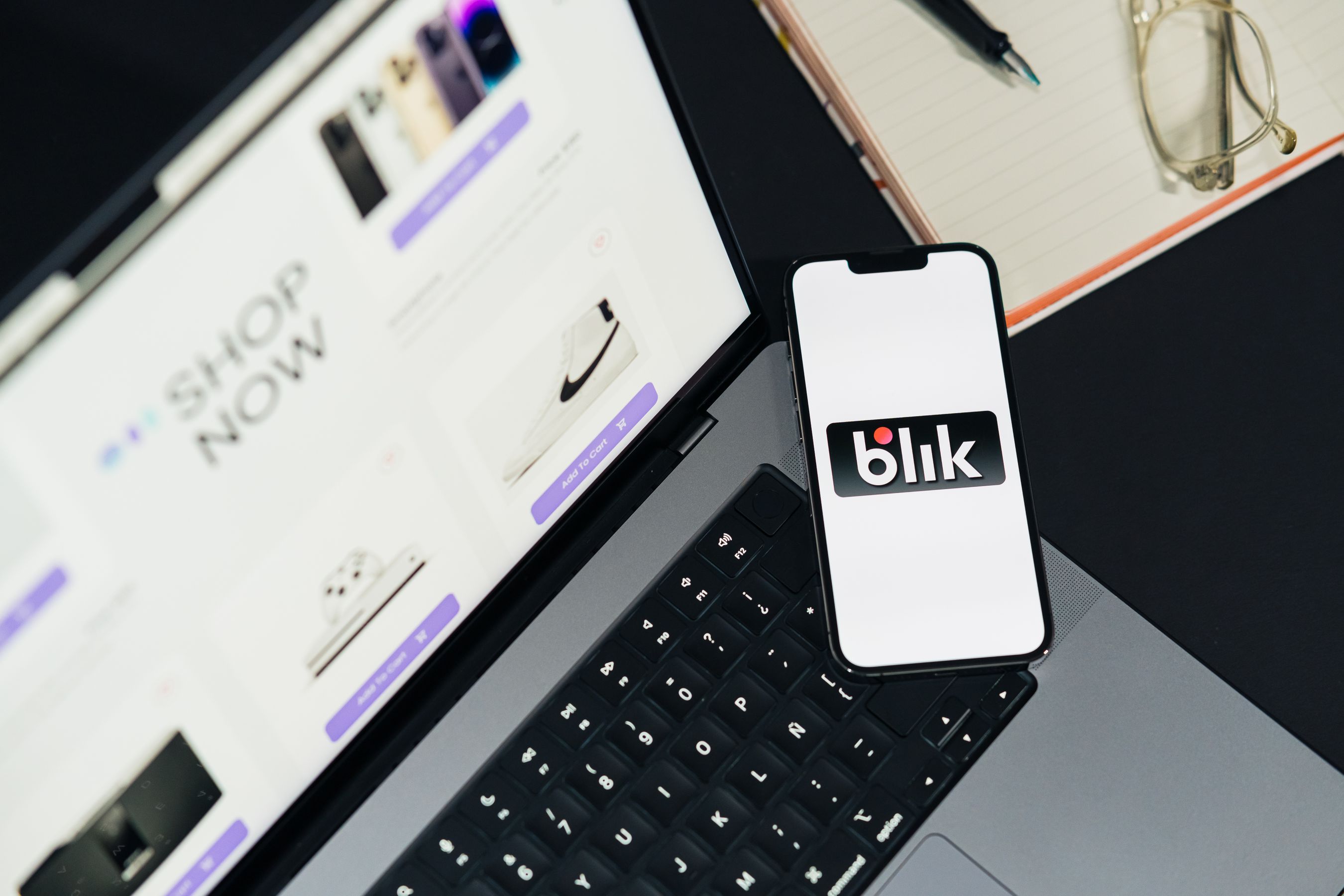 Online store displayed across laptop and smartphone screens