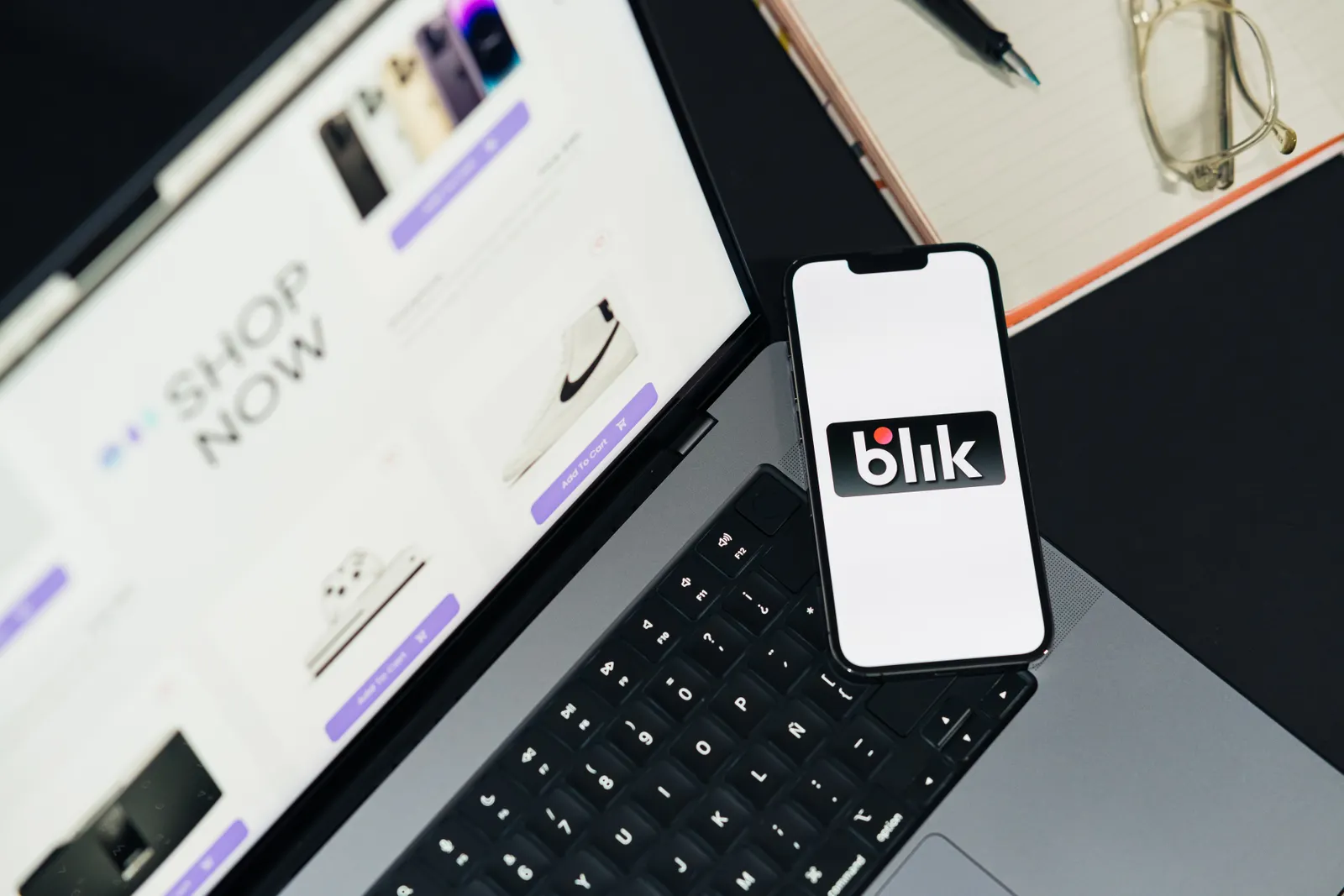 E-commerce shopping website displayed on laptop and smartphone