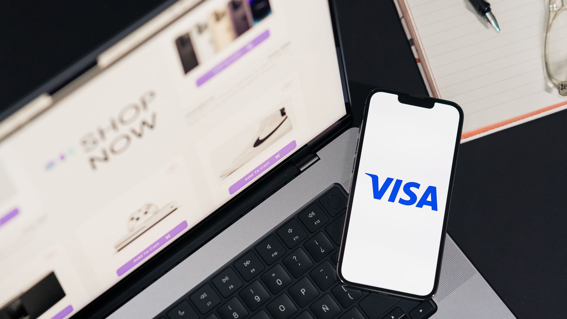 Ordering Modafinil Online: A Comprehensive Guide Smartphone displaying VISA on a laptop for online shopping experience.