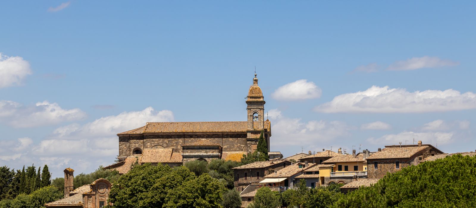 Charming historic architecture in Montalcino, Tuscany on a sunny day.