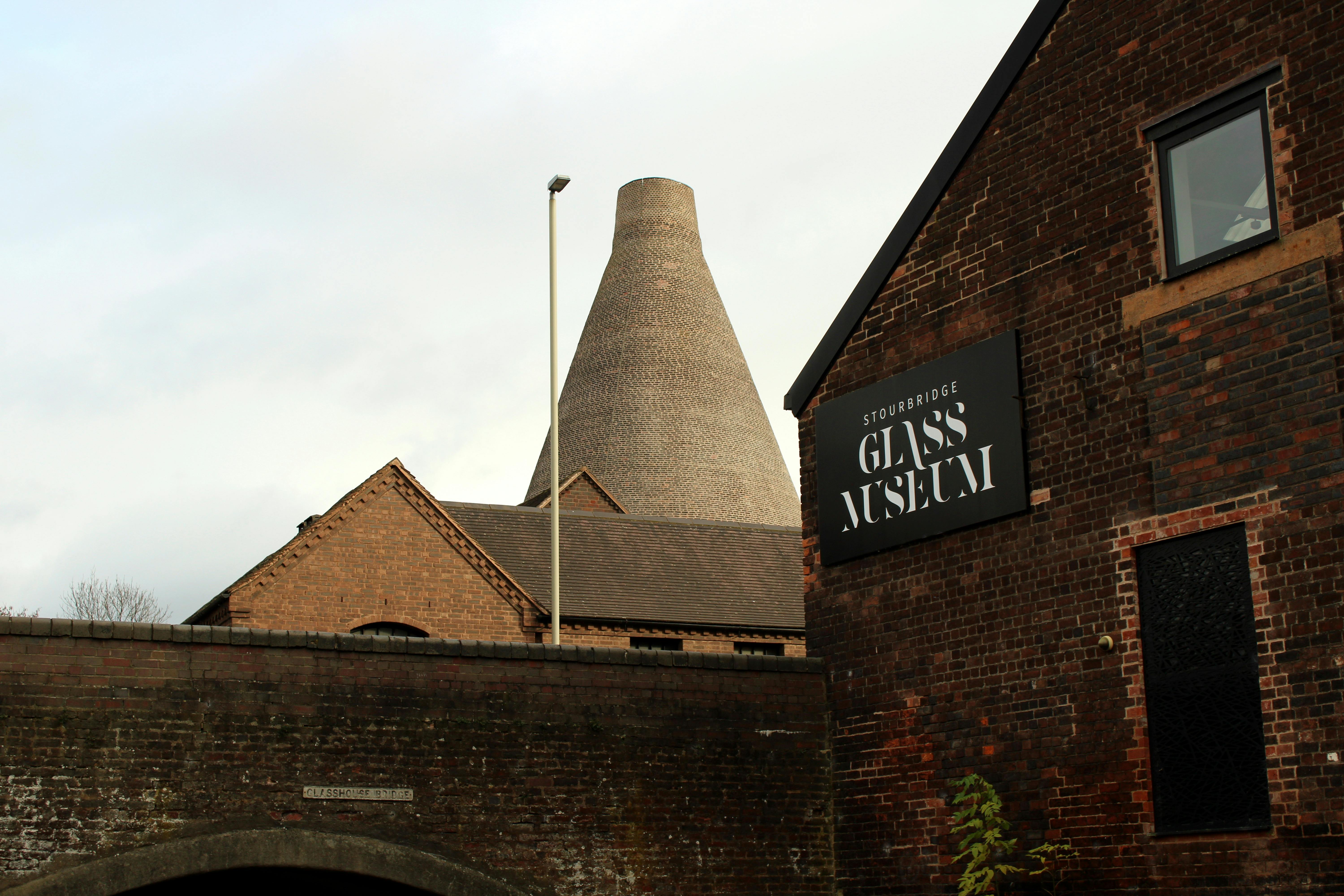 Historic Stourbridge Glass Museum in England with iconic cone structure.