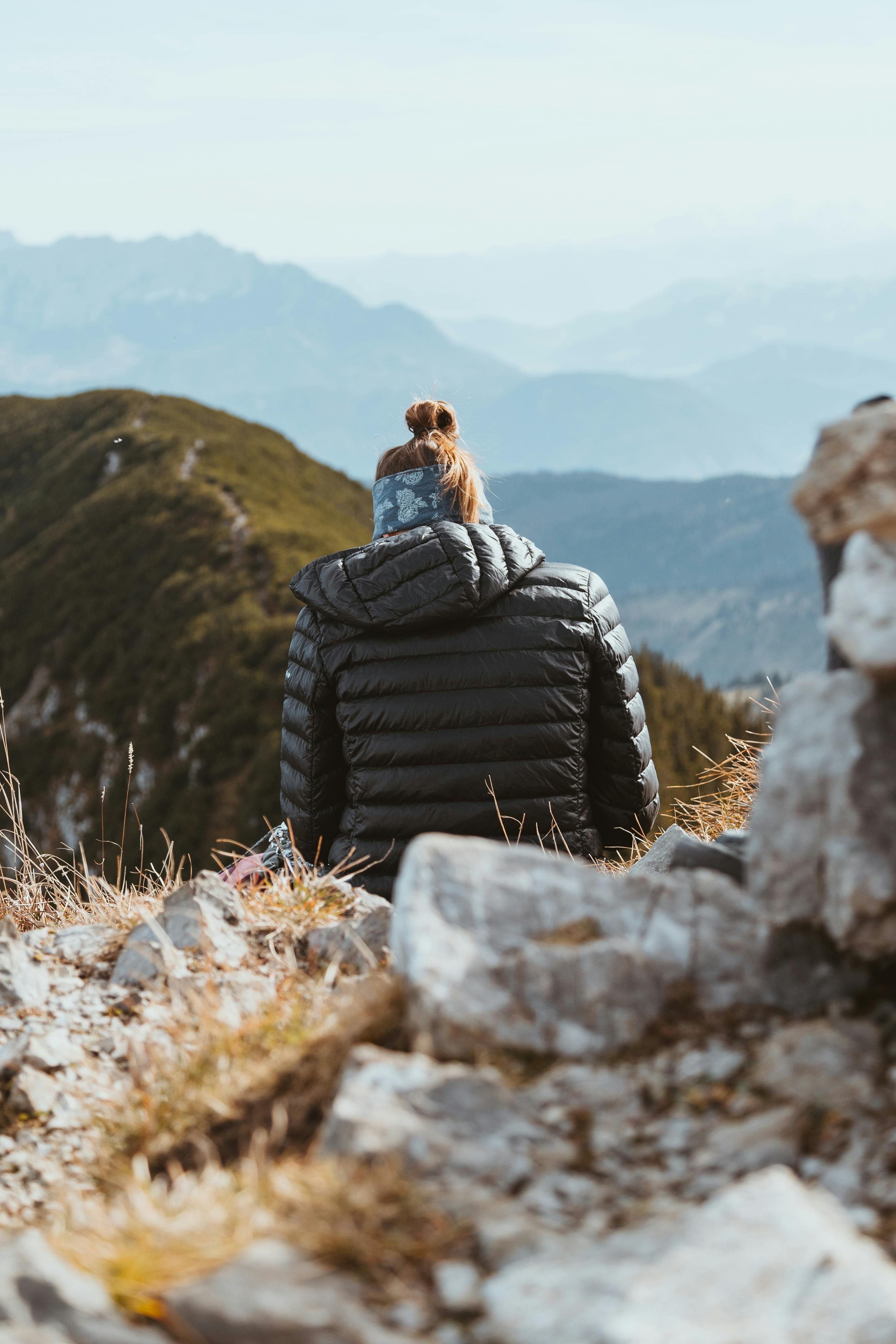 person enjoying mountain view in bayrischzell