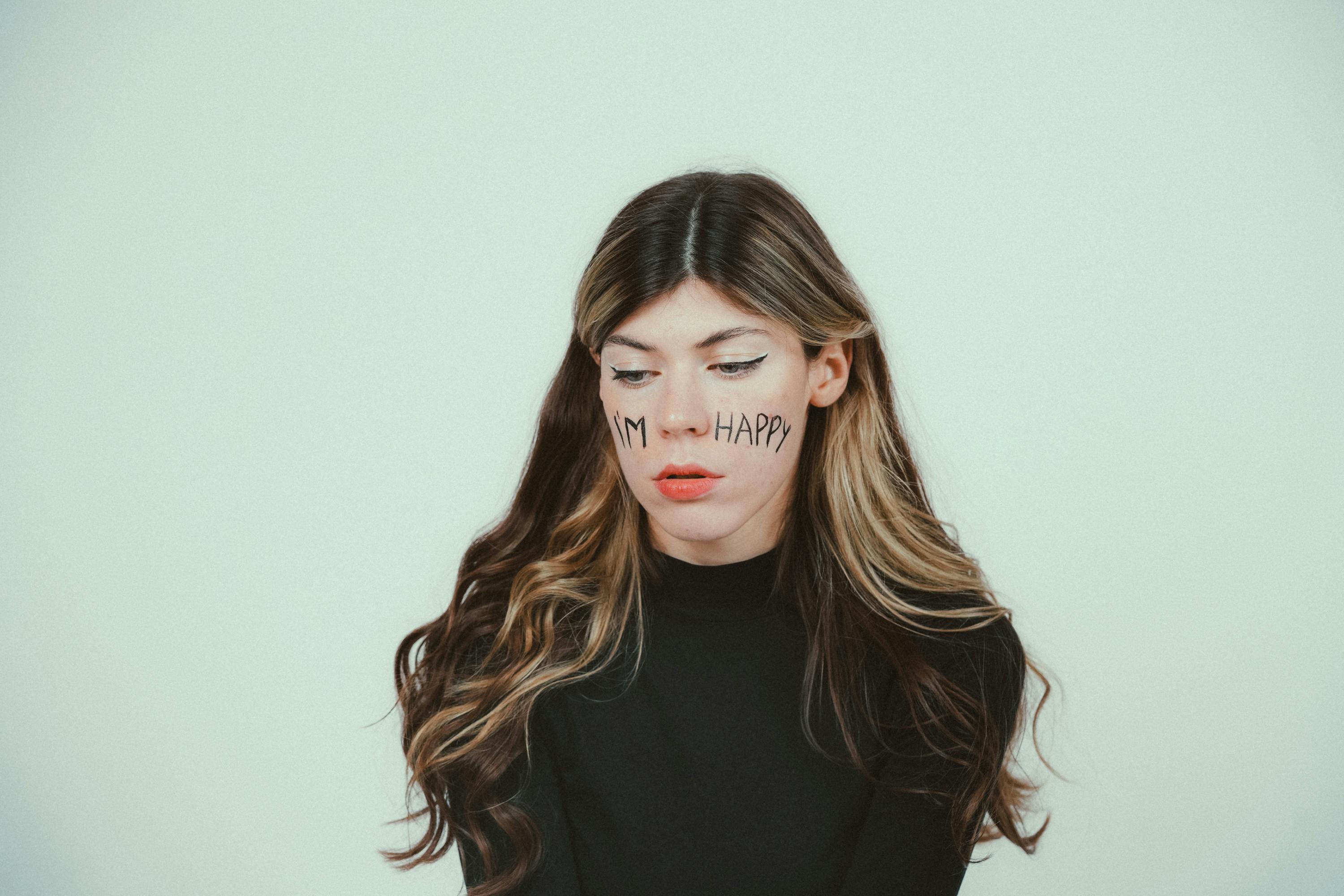 Person relaxing and daydreaming outside under the sun