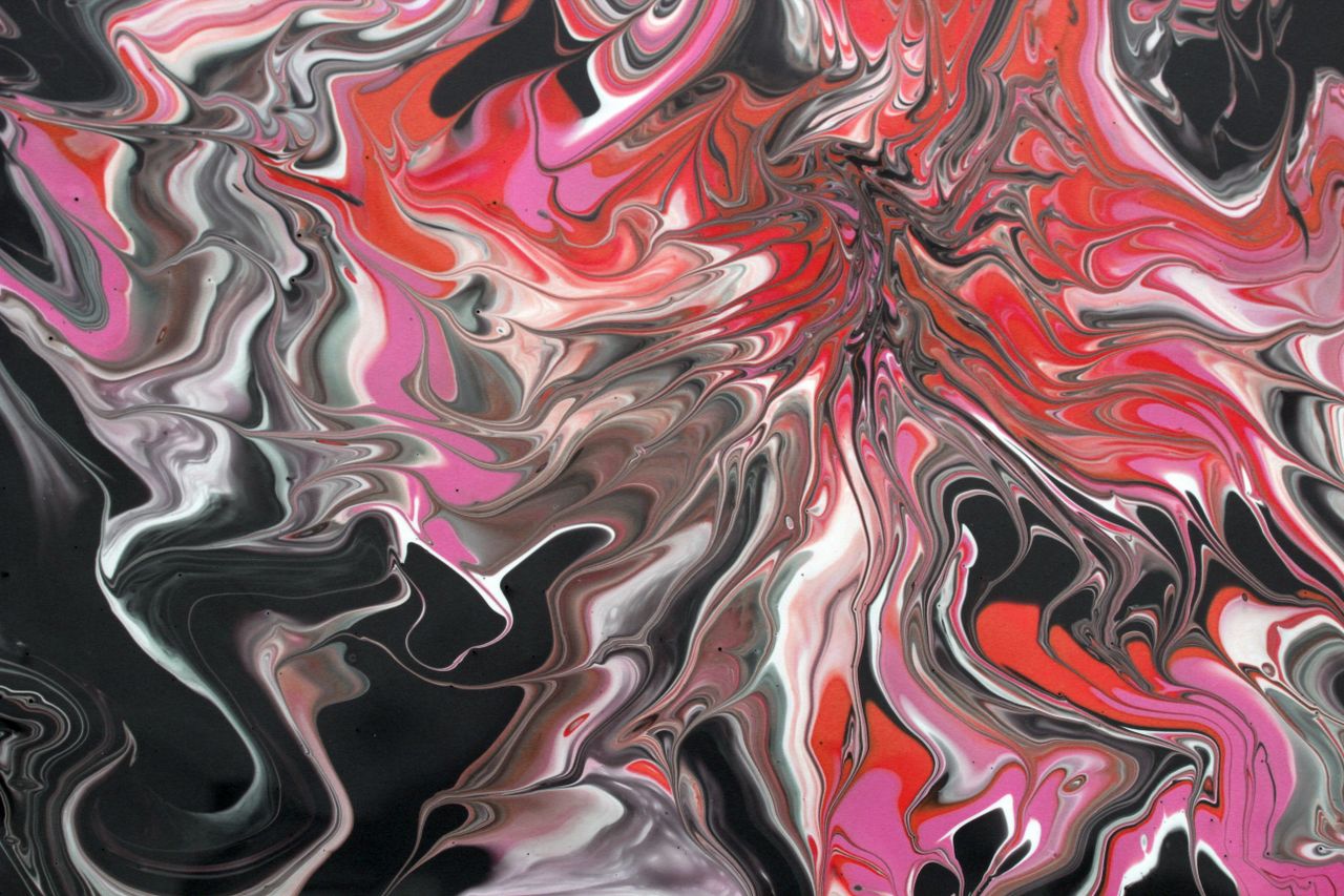 dynamic abstract painting with red black and white swirling patterns