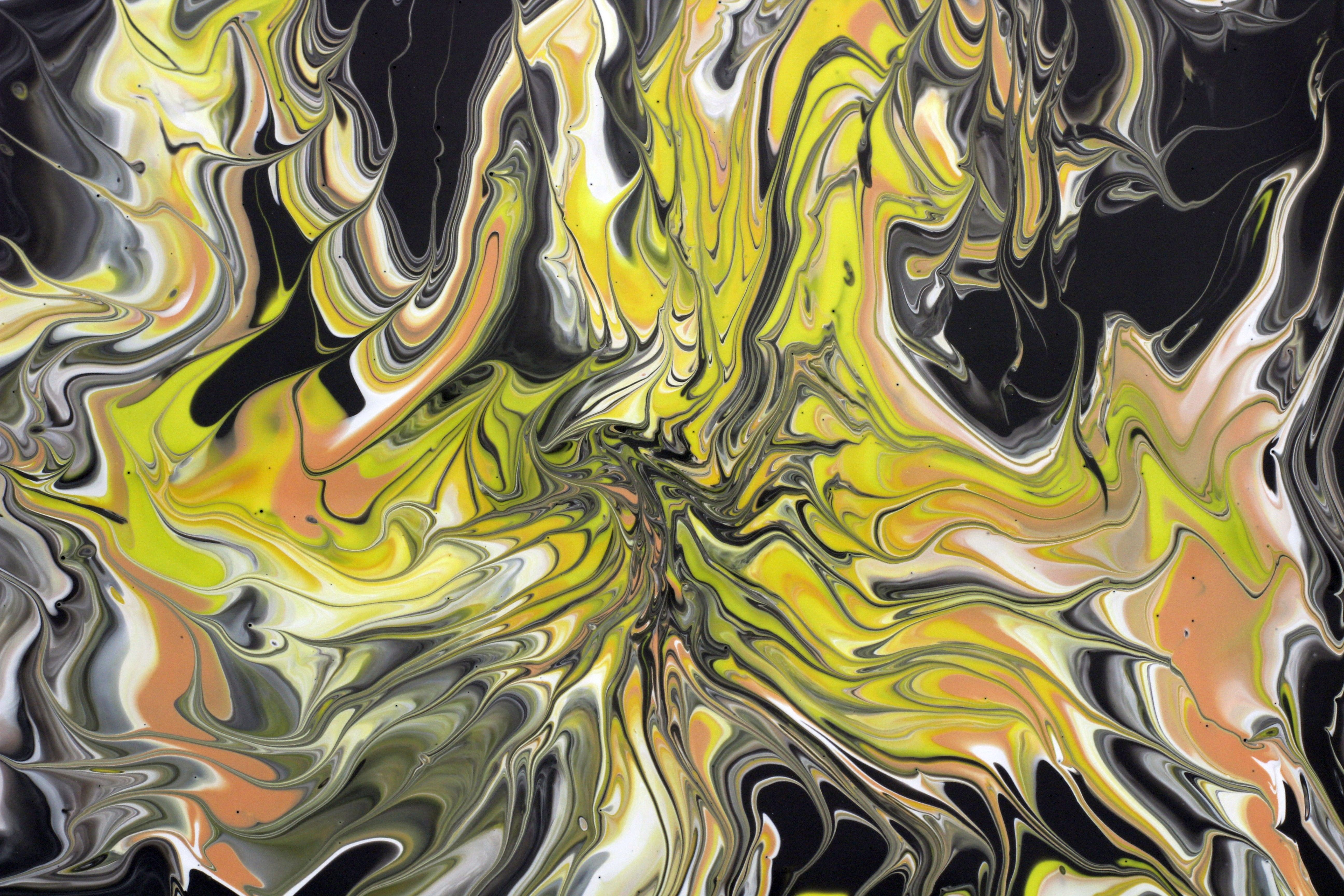Vibrant Abstract Paint Swirl Art in Yellow and Black · Free Stock Photo