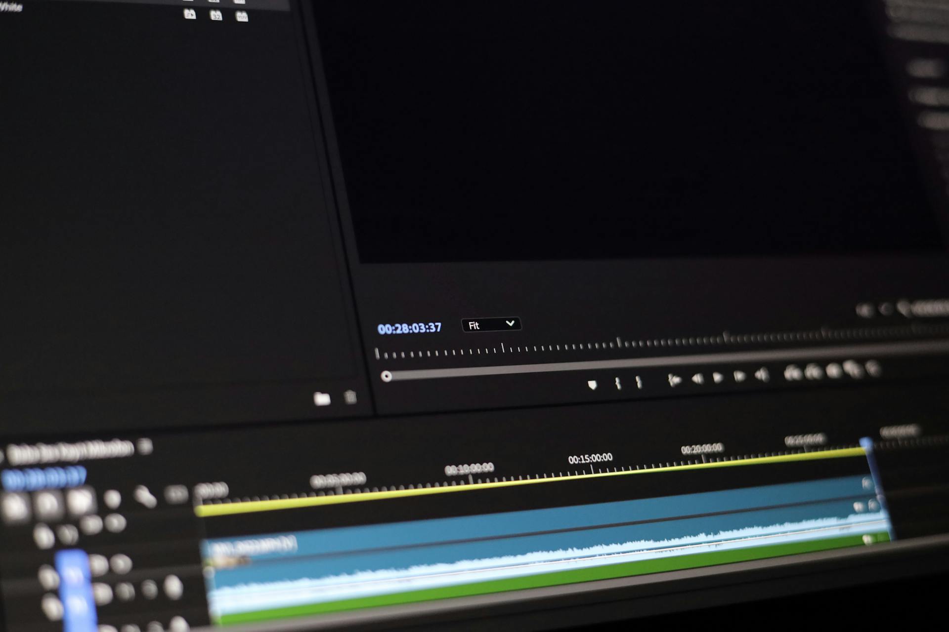 Close-up of a video editing software interface showing timeline and controls.