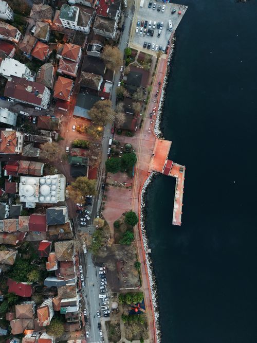 Free Scenic aerial shot of Yalova's coastline featuring residential area and pier. Stock Photo