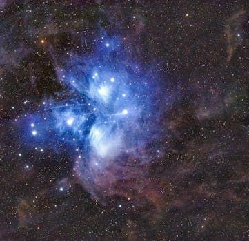 Captivating image of the Pleiades star cluster, showcasing cosmic beauty with vivid colors.