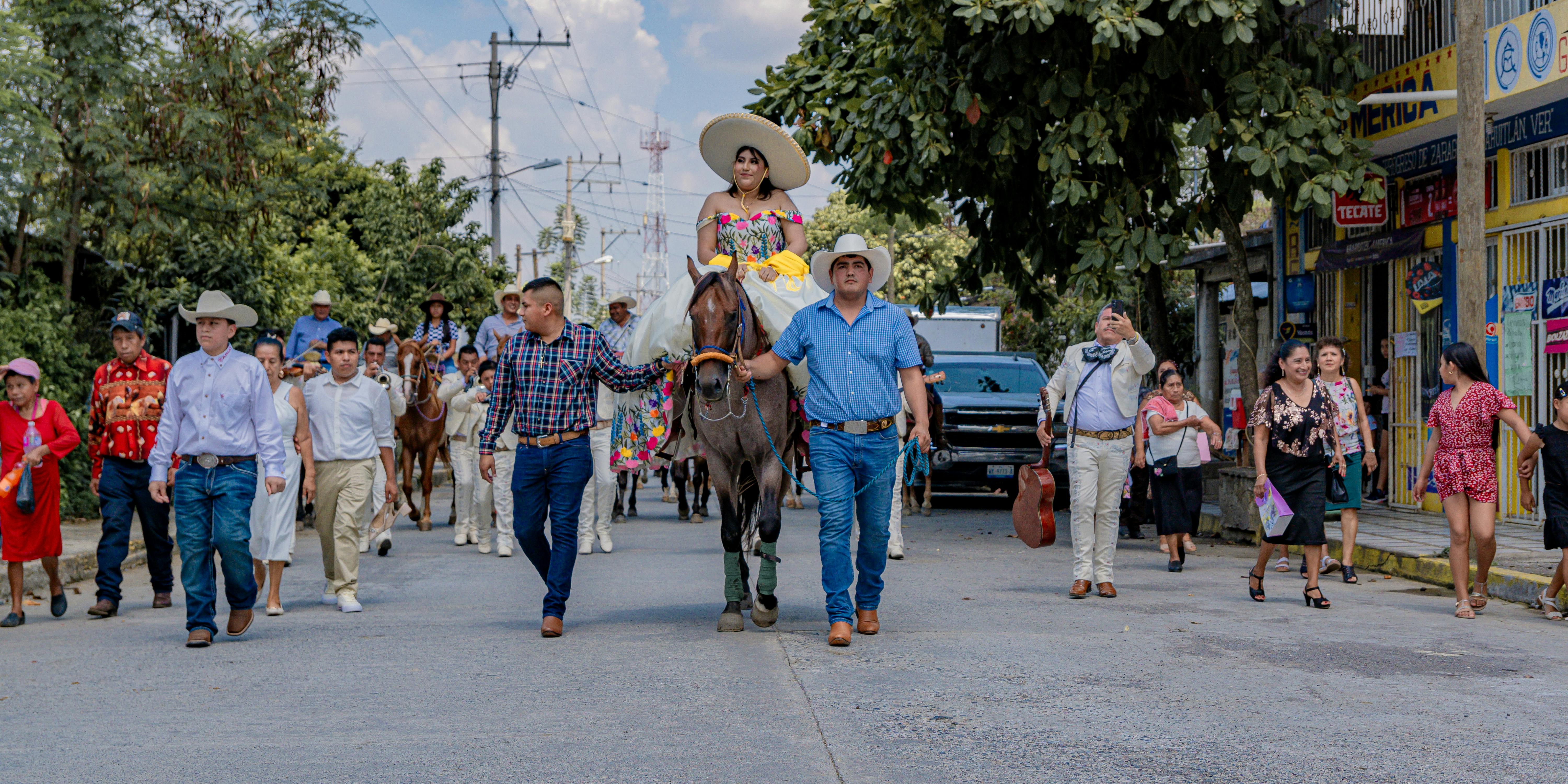A professional woman working on her laptop while analyzing data and a cup of coffee.