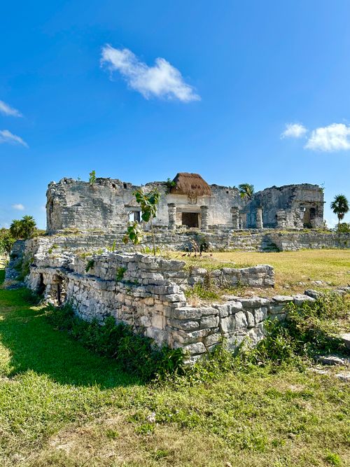 Free Explore the ancient ruins of Tulum surrounded by lush greenery under a clear blue sky. Stock Photo