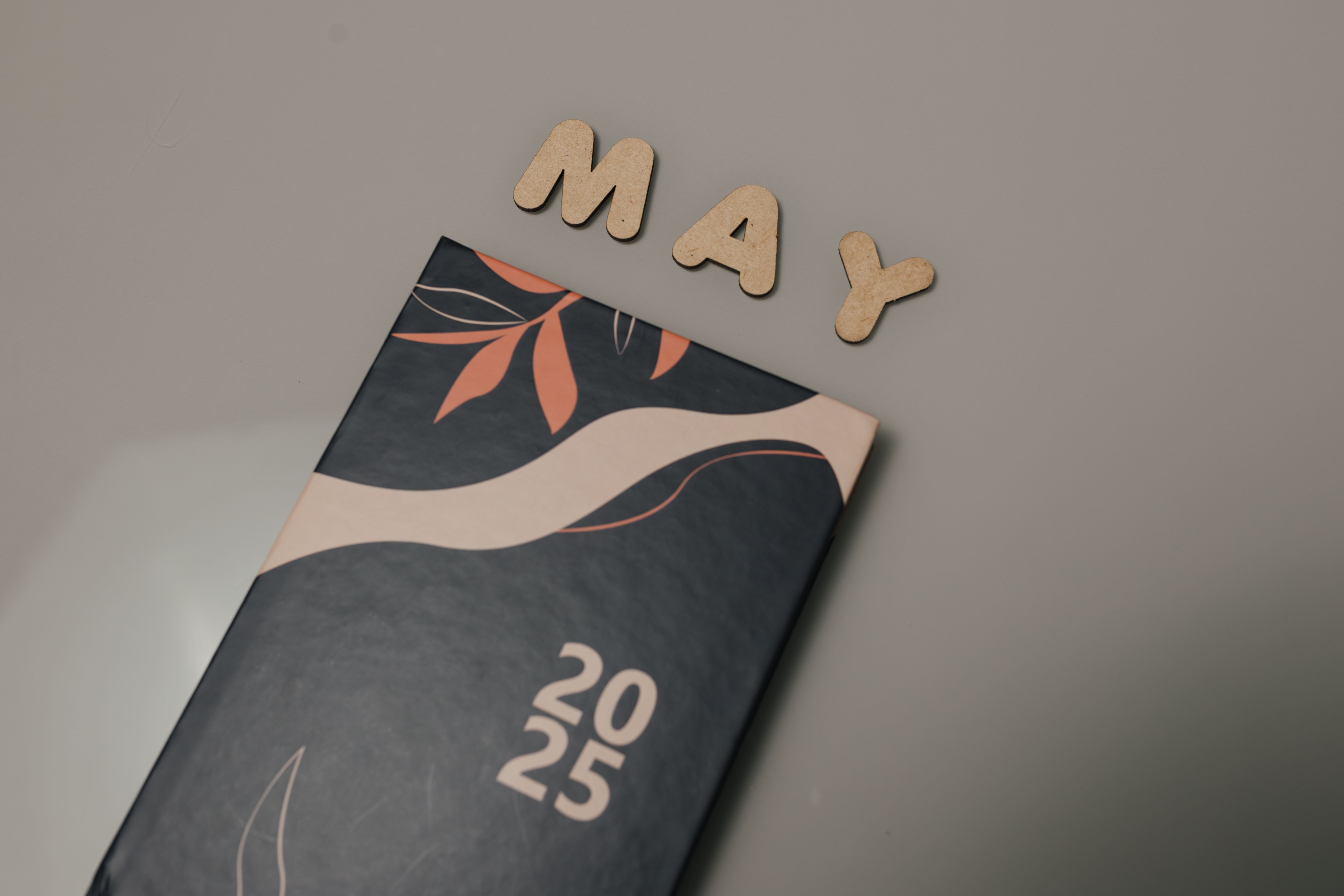Stylish 2025 Planner with Wooden May Letters · Free Stock Photo