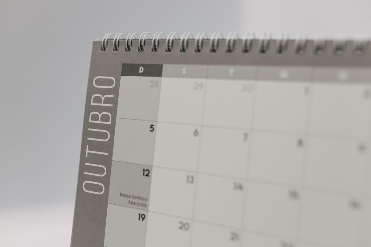 Desk calendar open to a full month view