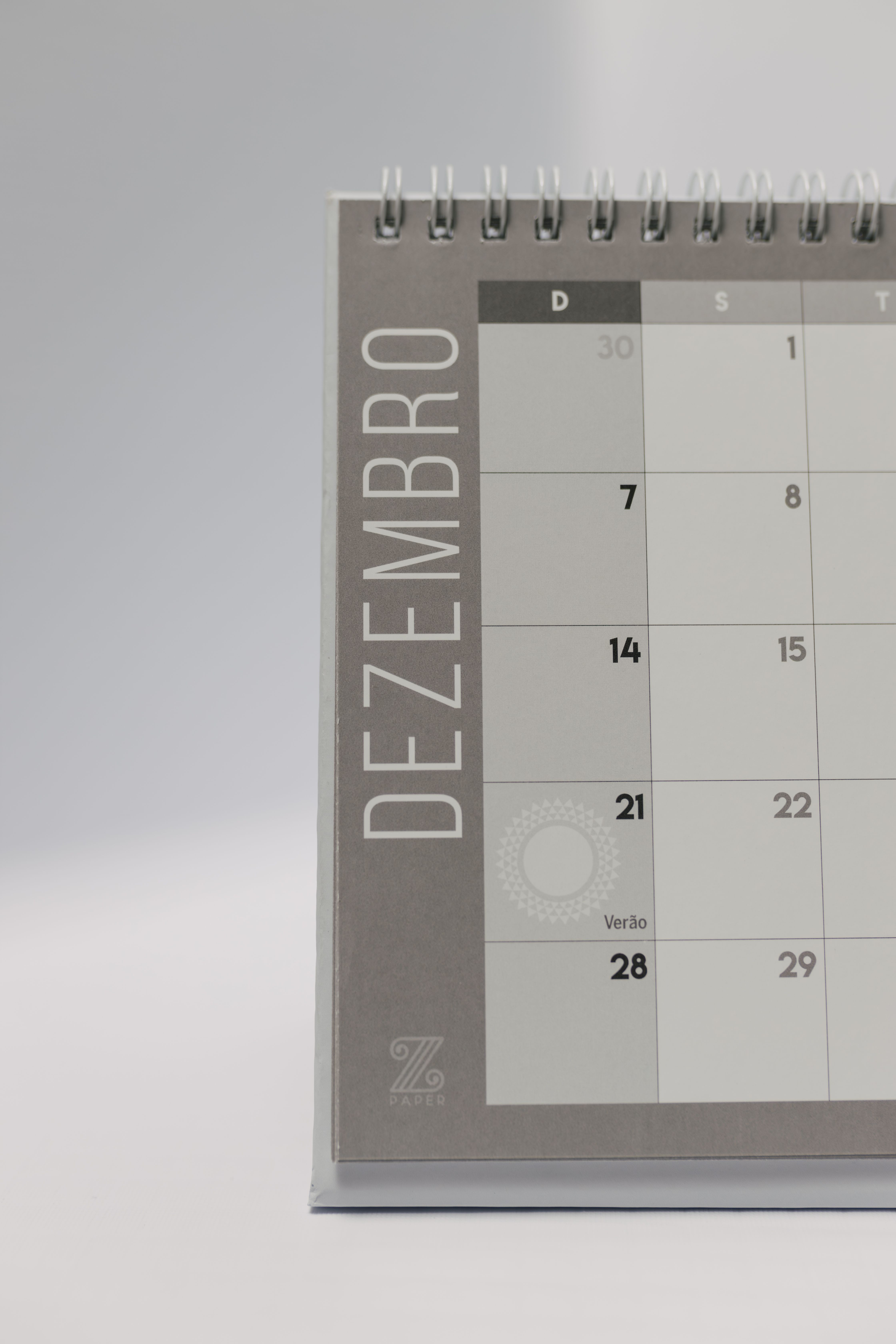 Close-up of a minimalist December calendar page with spiral binding.