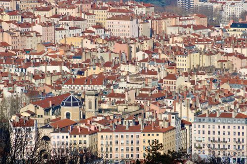 Free Aerial view of traditional rooftops in Lyon, showcasing vibrant architecture. Stock Photo