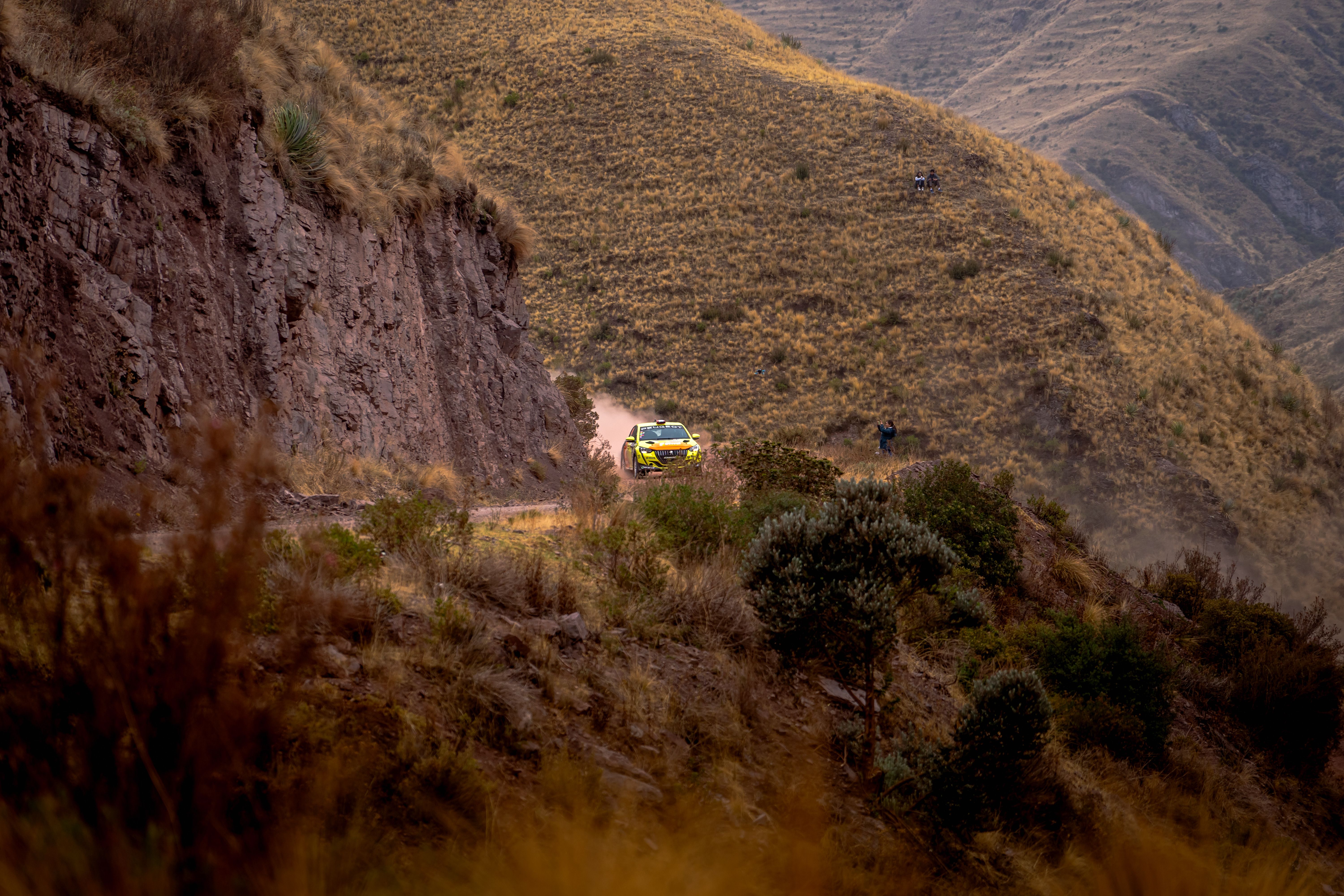 Rally Truck Navigating a Scenic Mountain Path · Free Stock Photo