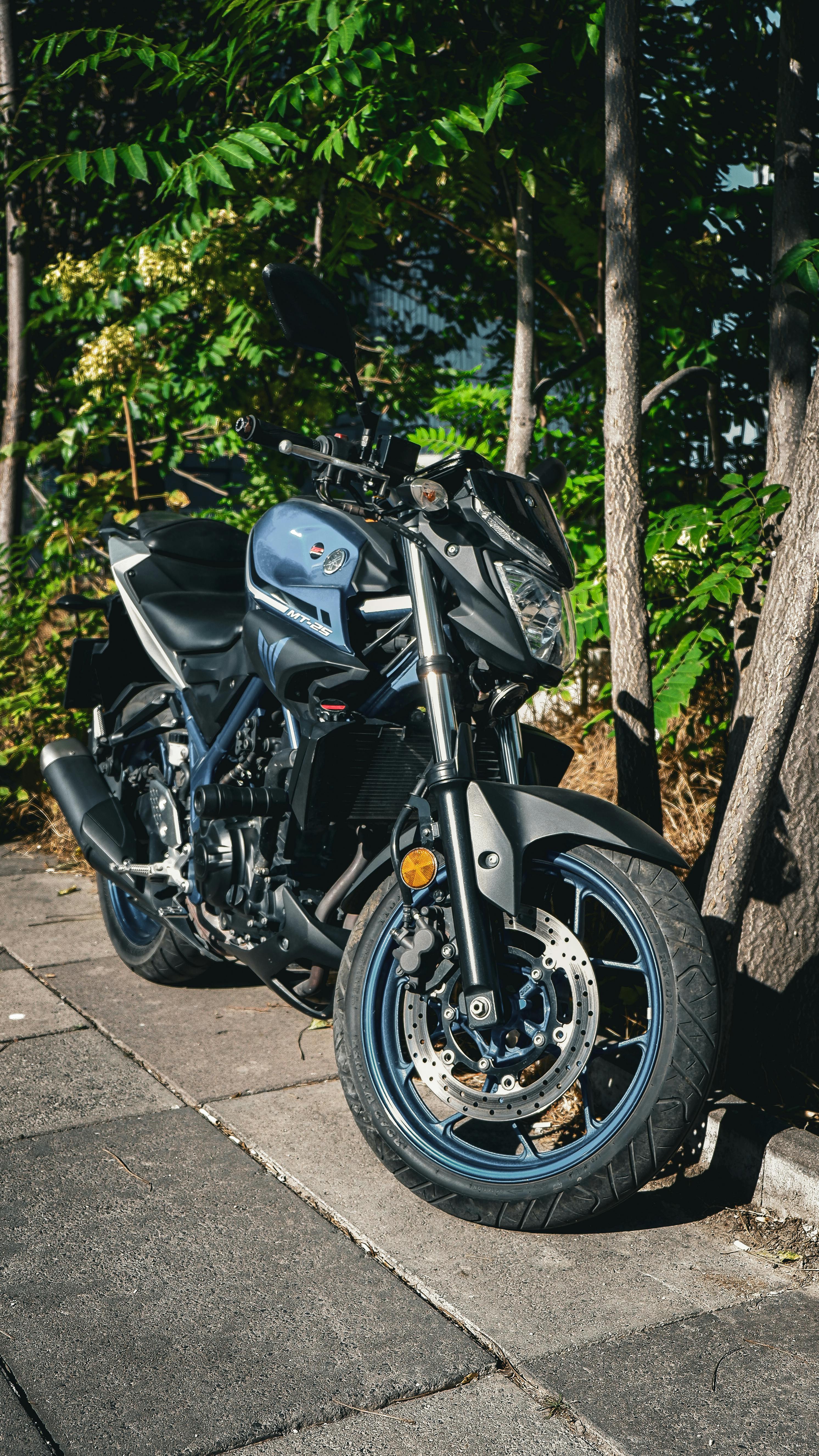 Free A modern motorcycle parked in a scenic outdoor park in Ankara, Turkey. Stock Photo