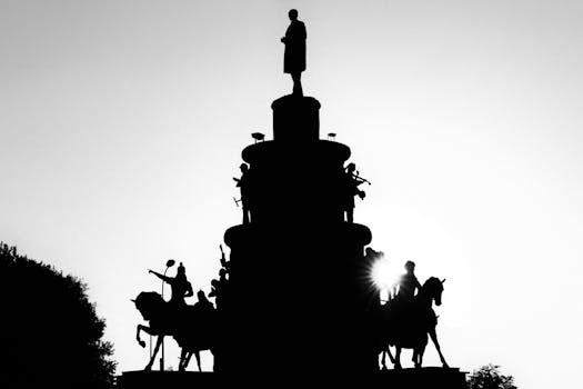 Black and white silhouette of a monument in Eskişehir, Türkiye, captured at sunset.